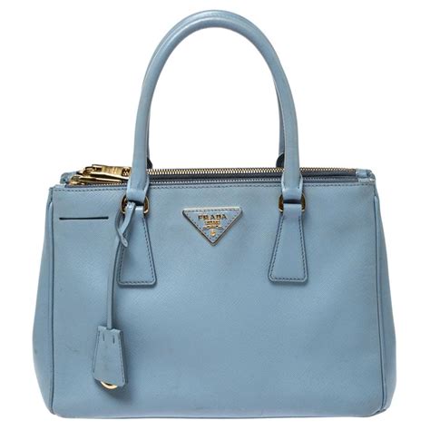 prada blue clutch handbag|prada light blue.